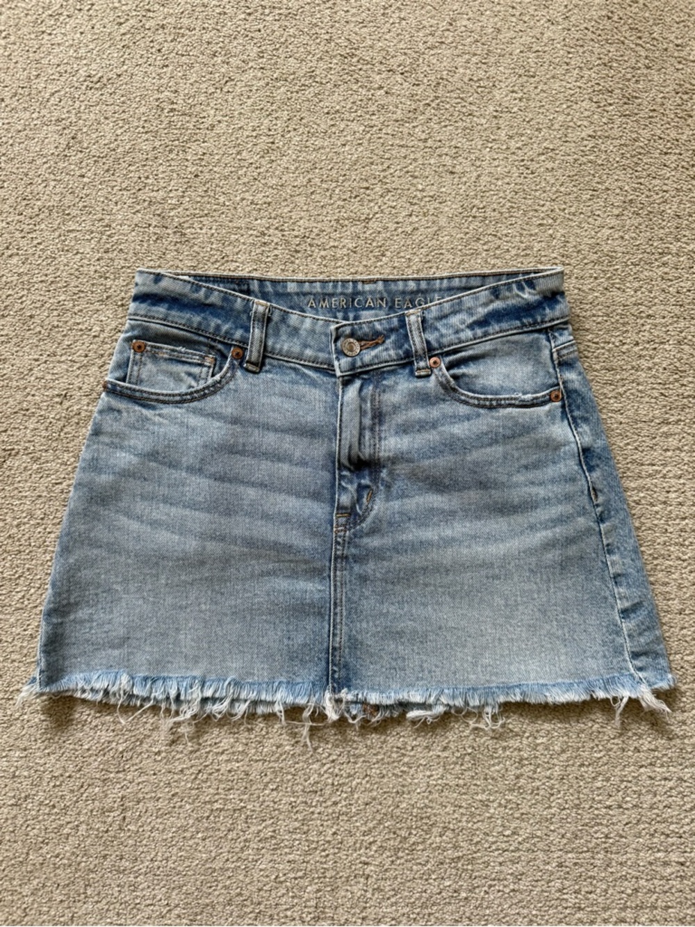 American Eagle Outfitters Light Wash Denim Frayed-Hem Mini Skirt